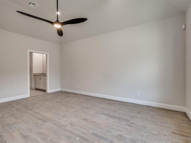 unfurnished room featuring vaulted ceiling, ceiling fan, and light hardwood / wood-style floors