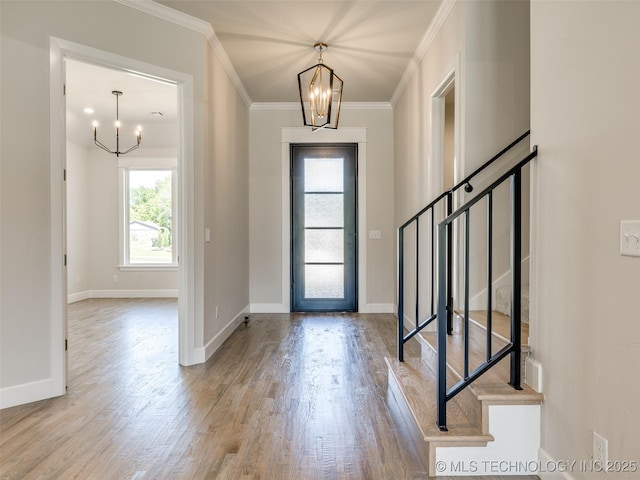 11224 S Fir Ave W, Jenks, OK 74037 - foyer entrance featuring a chandelier, stairs, crown molding, wood finished floors, and baseboards