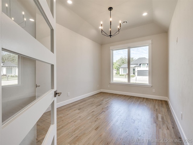 11224 S Fir Ave W, Jenks, OK 74037 - unfurnished dining area featuring a chandelier, wood finished floors, vaulted ceiling, baseboards, and recessed lighting