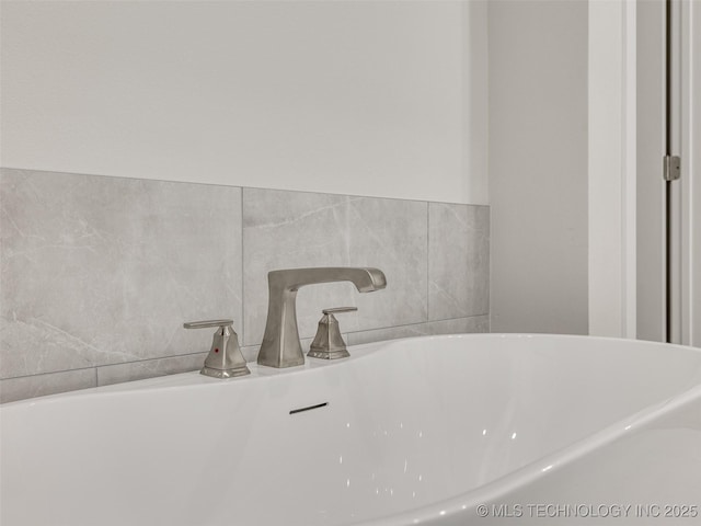 11224 S Fir Ave W, Jenks, OK 74037 - bathroom with a freestanding tub