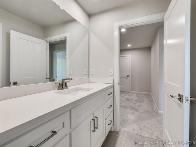 11224 S Fir Ave W, Jenks, OK 74037 - bathroom with vanity, recessed lighting, tile patterned flooring, and baseboards