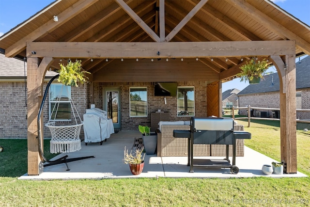 view of patio / terrace with a gazebo and a grill