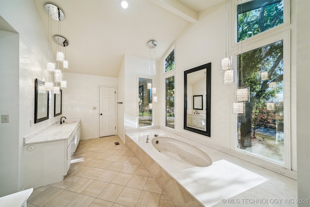 bathroom with beam ceiling, vanity, high vaulted ceiling, and tiled tub