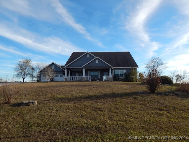 2270 E 154th St, Skiatook, OK 74070 - view of front facade featuring covered porch and a front lawn