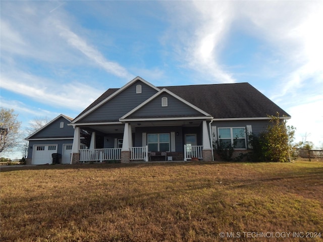 2270 E 154th St, Skiatook, OK 74070 - craftsman-style home featuring covered porch, a garage, a front yard, and brick siding
