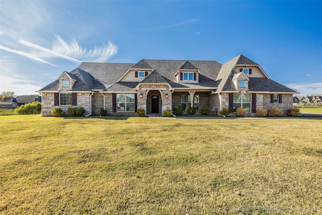 view of front of home with a front yard