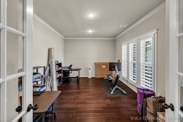 interior space featuring dark hardwood / wood-style flooring, ornamental molding, and french doors