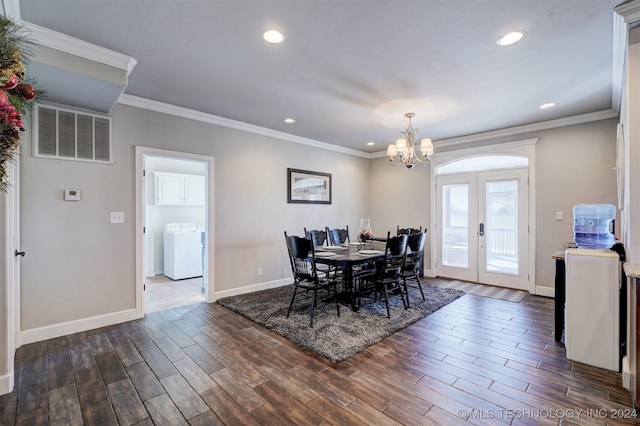 dining room featuring french doors, washer / clothes dryer, ornamental molding, and dark wood-type flooring