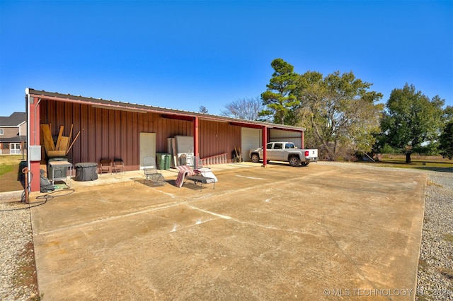 view of side of property featuring an outdoor structure