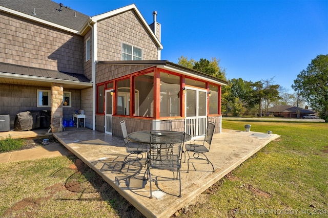 view of patio / terrace featuring central air condition unit and a sunroom