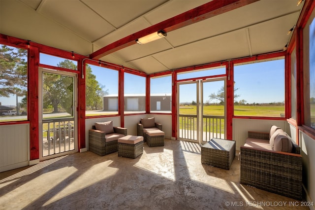 sunroom with vaulted ceiling