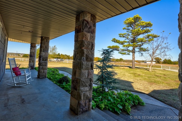 view of patio with a rural view