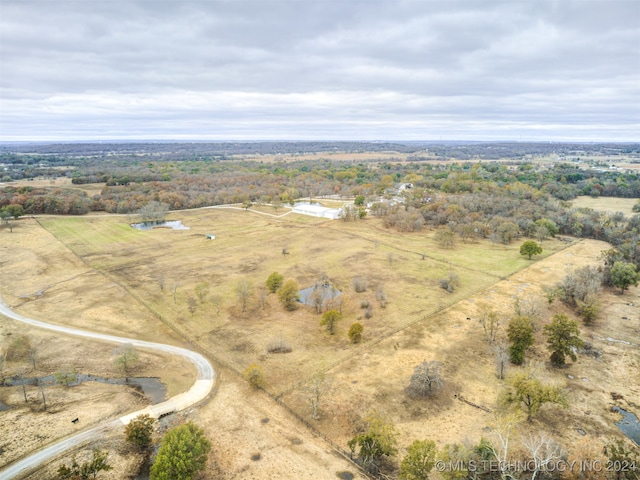 birds eye view of property featuring a rural view