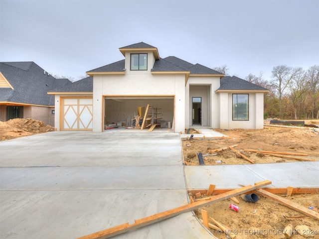 view of front of property featuring a garage