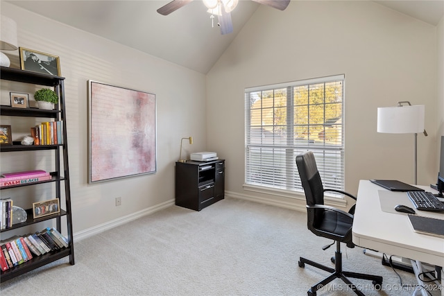 carpeted office featuring a wealth of natural light, ceiling fan, and high vaulted ceiling