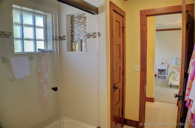 bathroom featuring shower / bath combination with glass door