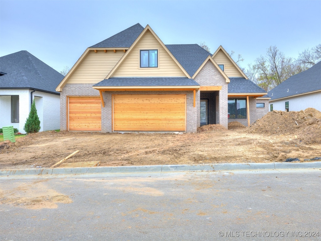 craftsman inspired home featuring a garage