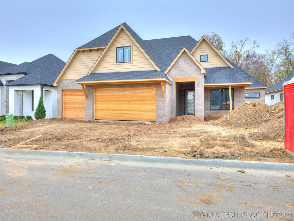 view of front of property featuring a garage