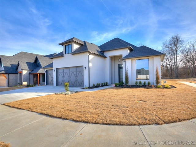 view of front of home with a garage