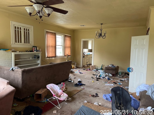 interior space featuring carpet flooring, ceiling fan with notable chandelier, and crown molding