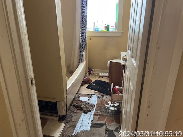 bathroom with vanity and shower / bathtub combination with curtain