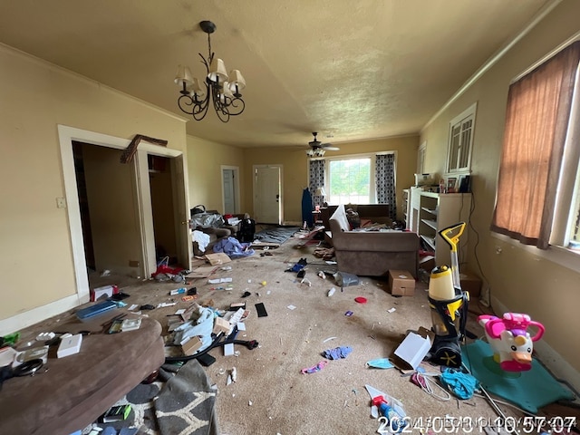 miscellaneous room featuring ceiling fan with notable chandelier and carpet floors