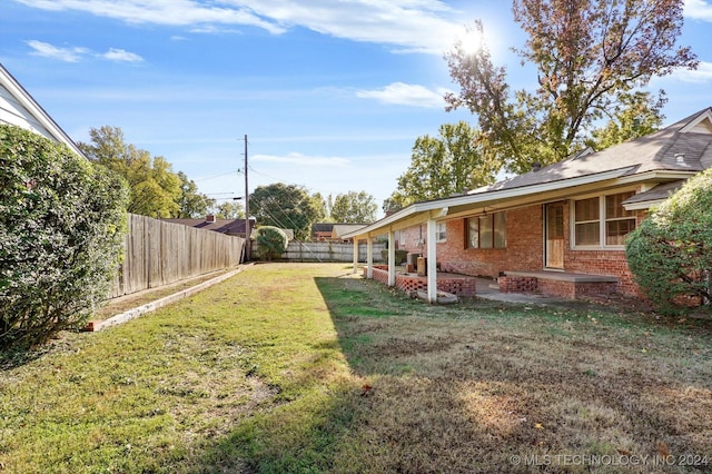 view of yard featuring a patio area