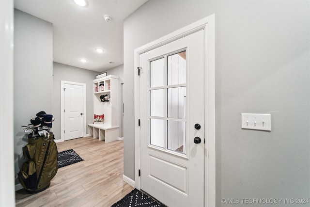 entryway with light hardwood / wood-style flooring