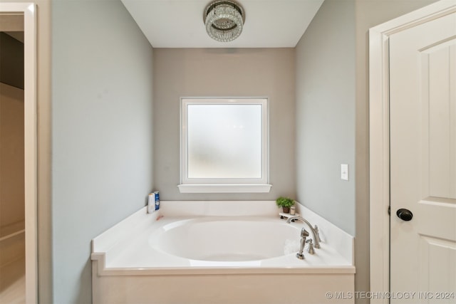 bathroom featuring a bath