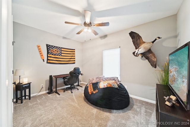 home office featuring ceiling fan and carpet floors