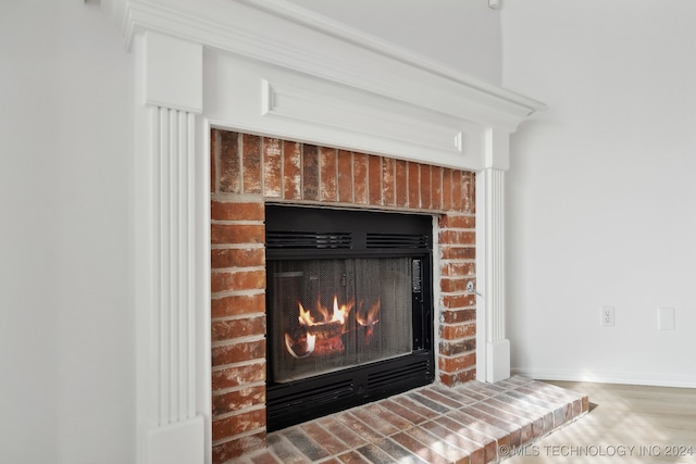 details with baseboards and a fireplace