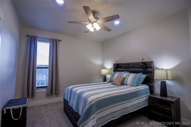 carpeted bedroom with ceiling fan