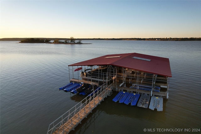 dock area featuring a water view