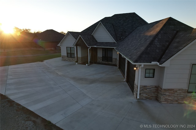 view of front of property with a garage