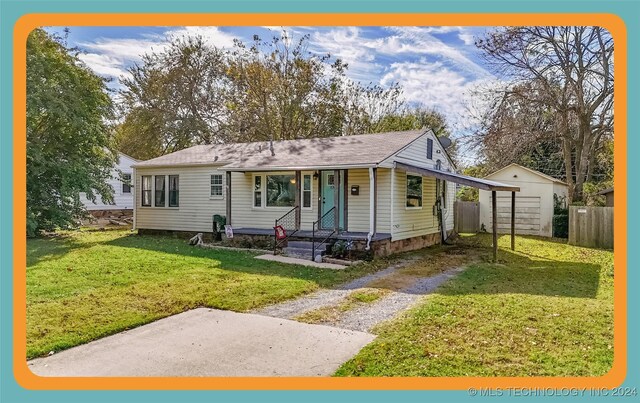 1306 E Comanche Ave, Mcalester, OK 74501 - view of front of house featuring driveway
