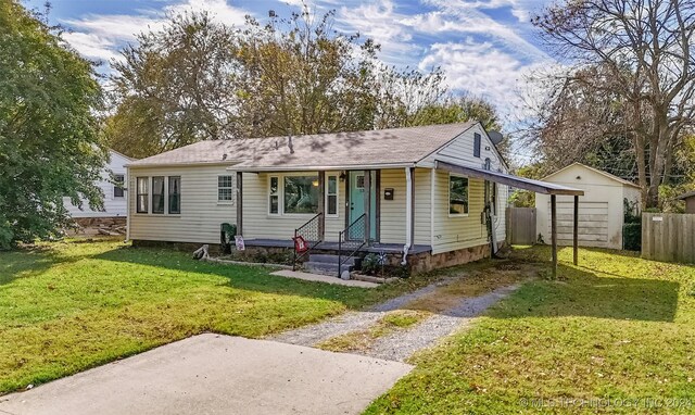 1306 E Comanche Ave, Mcalester, OK 74501 - view of front of property featuring dirt driveway and a shingled roof