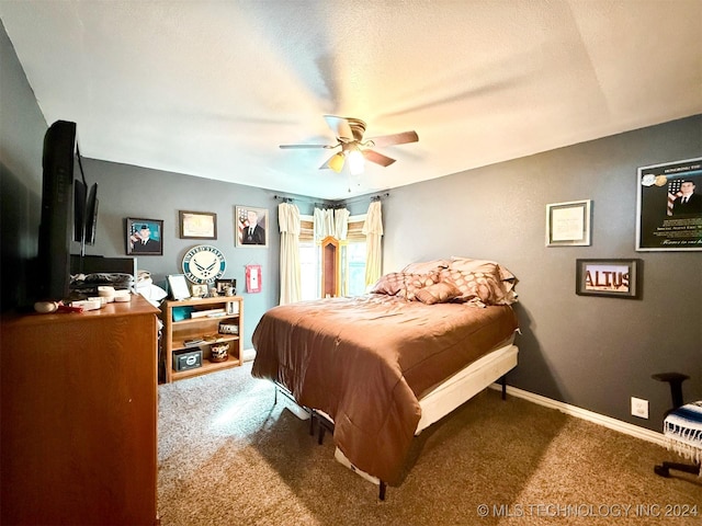 1306 E Comanche Ave, Mcalester, OK 74501 - bedroom featuring carpet, baseboards, and ceiling fan