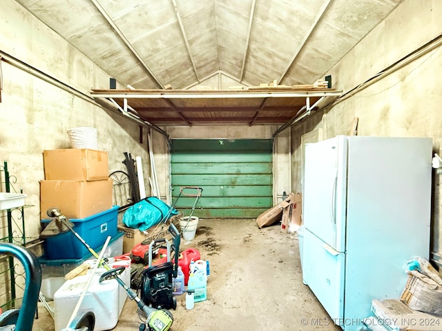 garage featuring white fridge