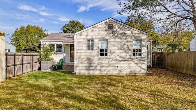 1306 E Comanche Ave, Mcalester, OK 74501 - rear view of house with central air condition unit