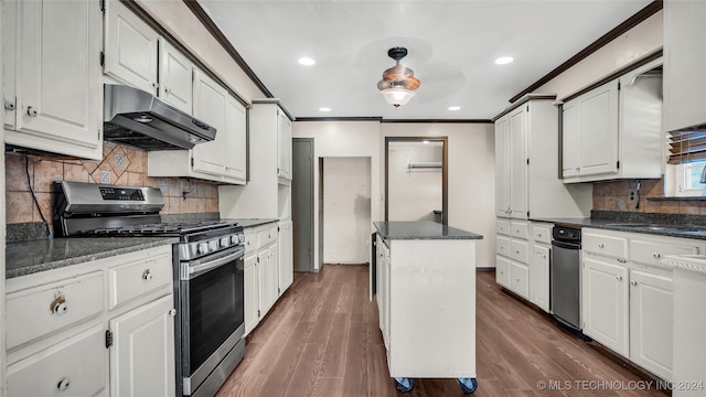 kitchen with dark hardwood / wood-style floors, white cabinetry, and stainless steel range with gas cooktop