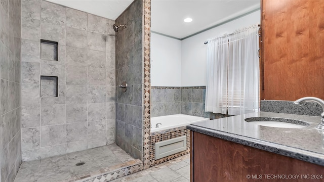 bathroom with vanity and plus walk in shower