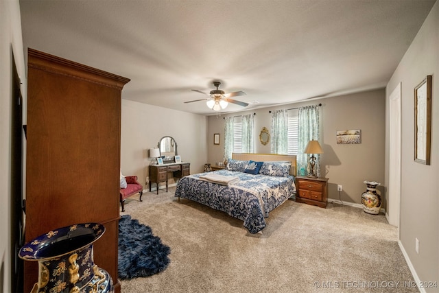 bedroom with carpet floors and ceiling fan