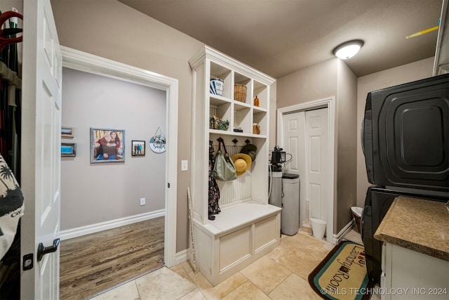 mudroom featuring light tile patterned flooring