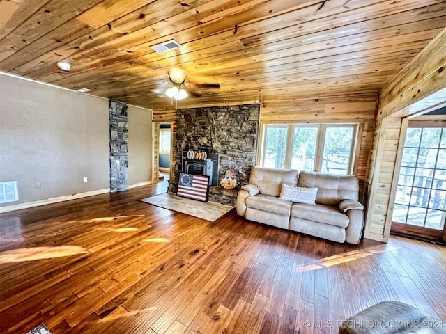 unfurnished living room featuring hardwood / wood-style flooring, ceiling fan, wood ceiling, and vaulted ceiling