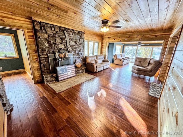 unfurnished living room with a wealth of natural light and hardwood / wood-style flooring