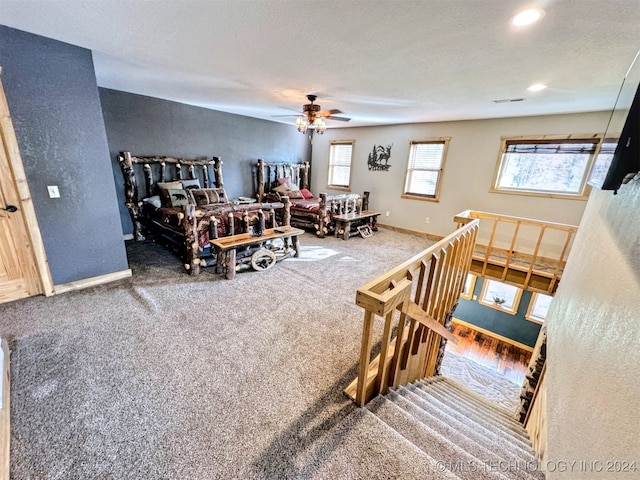 carpeted bedroom with a textured ceiling