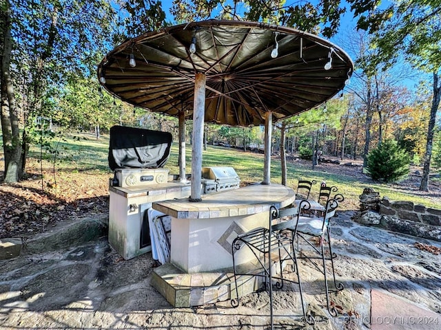 view of patio with area for grilling