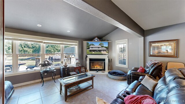 tiled living room featuring lofted ceiling