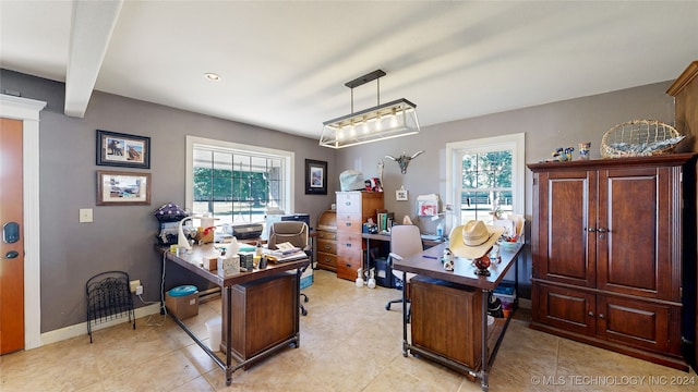 tiled office space with beam ceiling and plenty of natural light