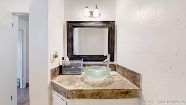 bathroom featuring tile patterned floors and vanity